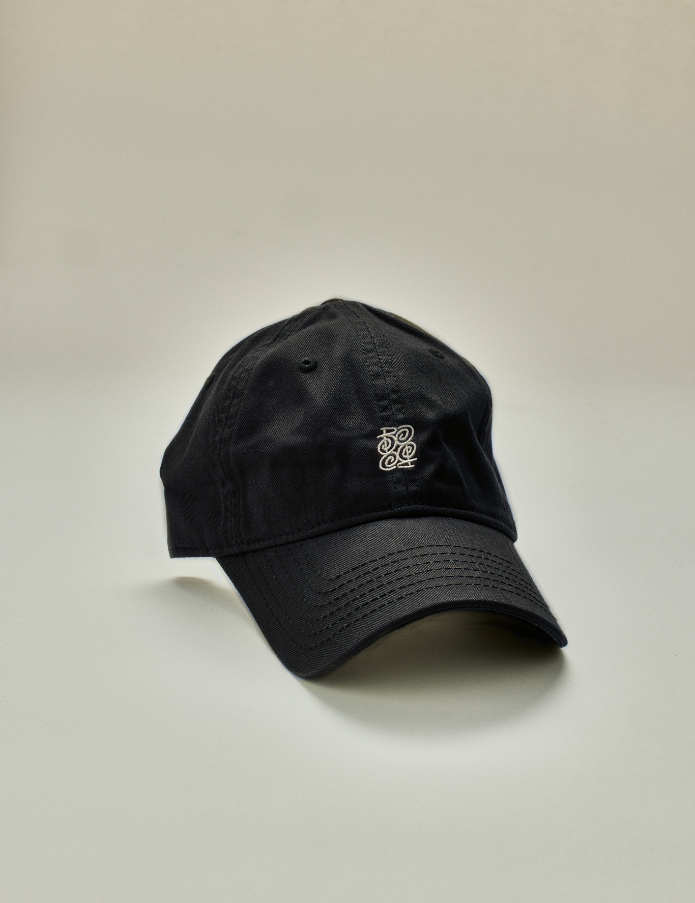 BOBO_black_cap_white_mark_20bb940a-a714-44dc-b5b6-e849dcec7b66.png